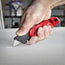 Couteau utilitaire pliant FASTBACK™ avec rangement des lames