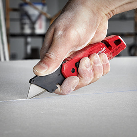 Couteau utilitaire pliant FASTBACK™ avec rangement des lames