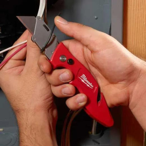 Couteau utilitaire pliant compact FASTBACK™